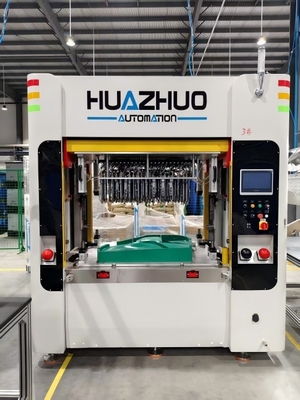 Heat staking welding machine for vehicle door panel