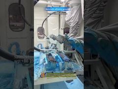 Automated adhesive spraying as a pre-laminating process for automotive interior components